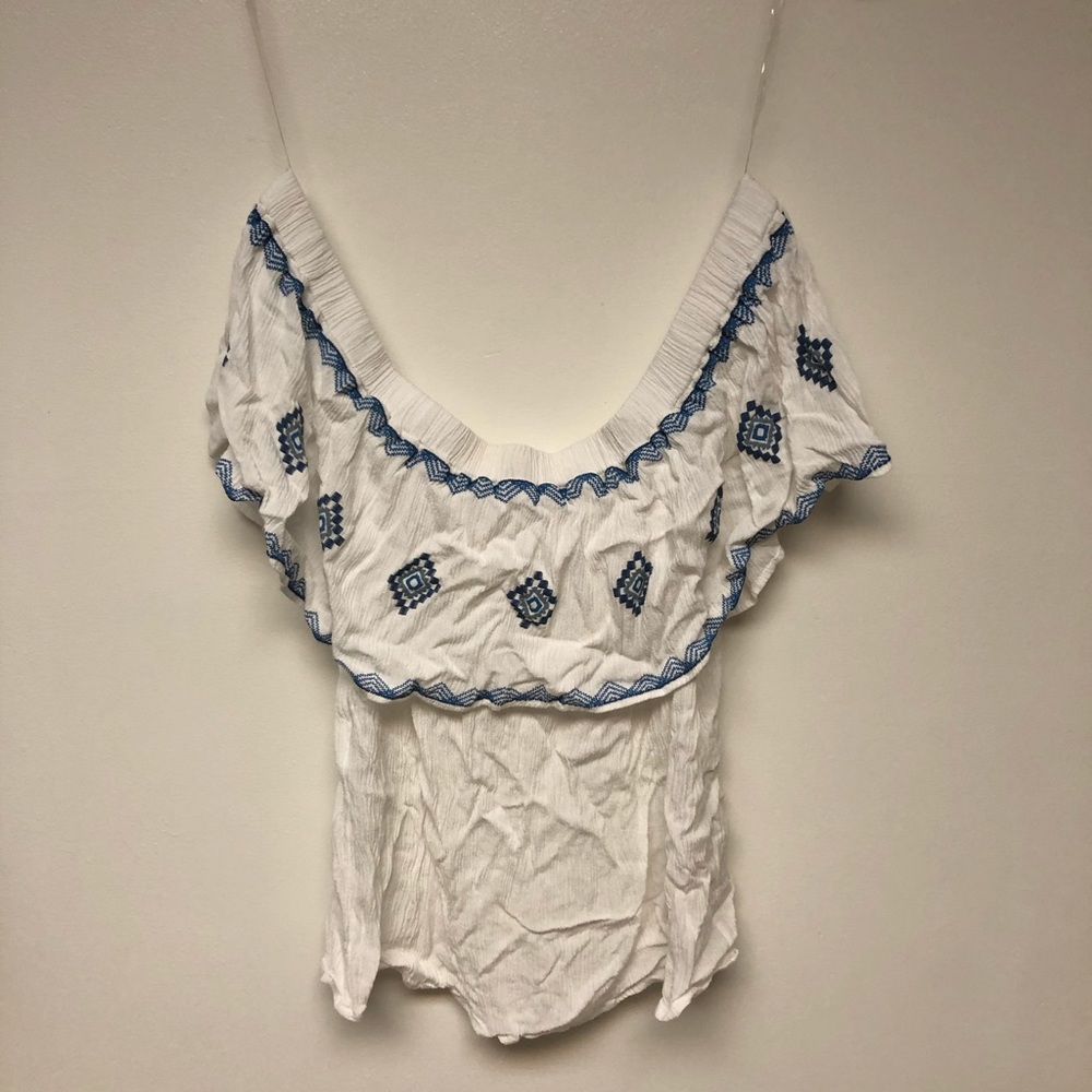 | Lily White | off the shoulder top. Size L.